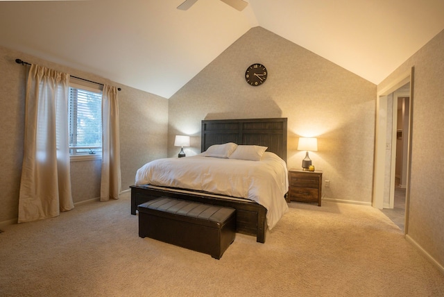 bedroom featuring lofted ceiling, light carpet, and ceiling fan