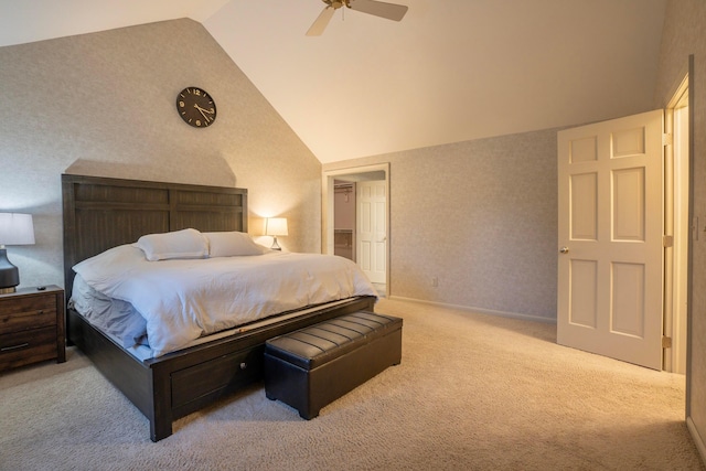 bedroom with high vaulted ceiling, light colored carpet, and ceiling fan