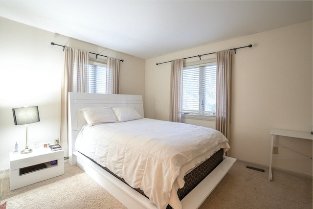 bedroom featuring carpet