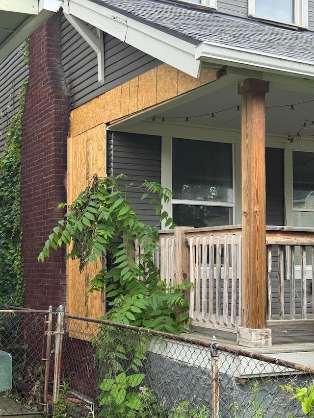156 Winner Ave, Columbus, OH 43203 - view of side of home featuring covered porch and a shingled roof