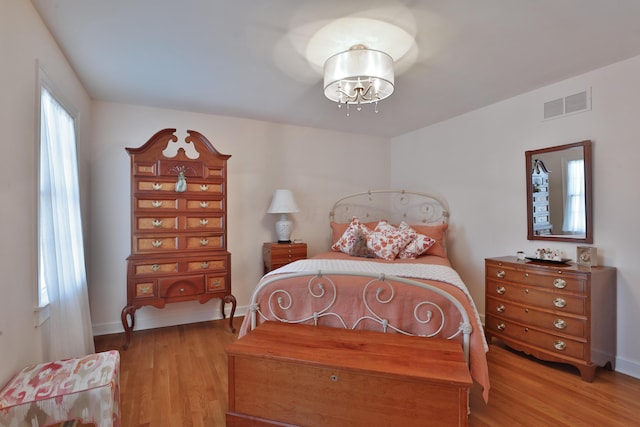 bedroom featuring light hardwood / wood-style flooring