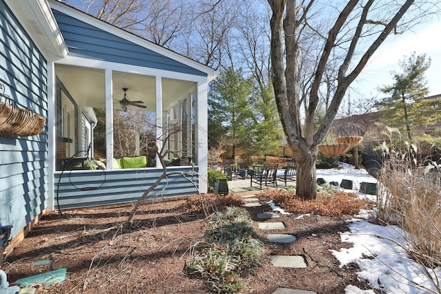 view of yard featuring ceiling fan and a patio area