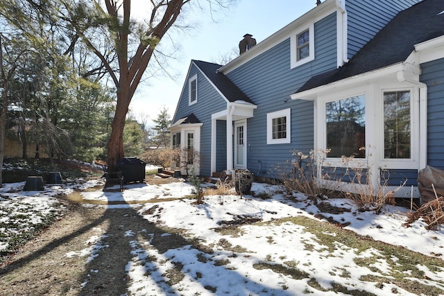 view of snow covered property