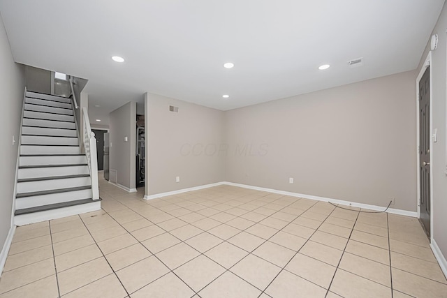 interior space with light tile patterned floors