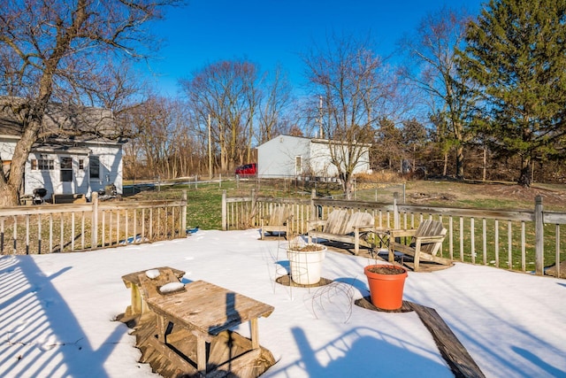 wooden terrace featuring a patio area