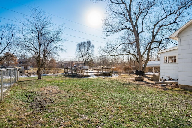 view of yard with a wooden deck