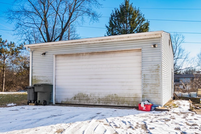 view of snow covered garage