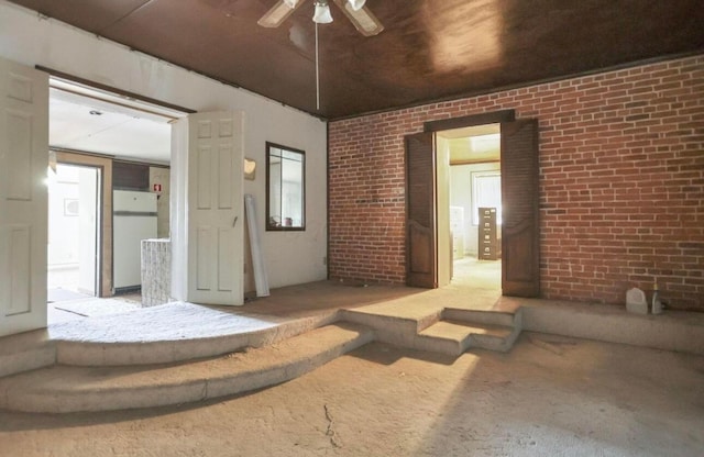 interior space featuring ceiling fan