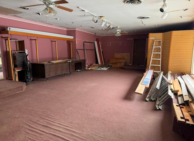 misc room with ornamental molding, carpet floors, and ceiling fan