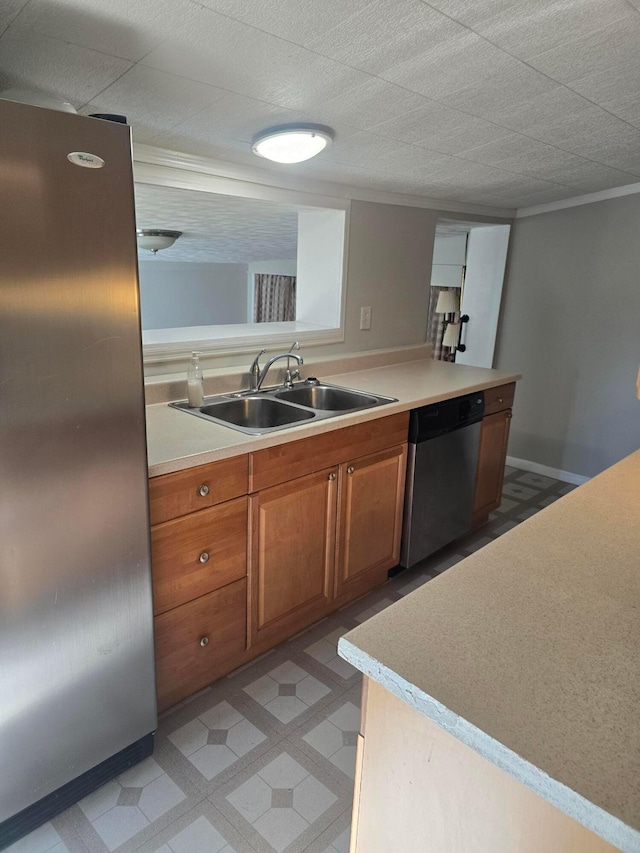 kitchen with appliances with stainless steel finishes and sink