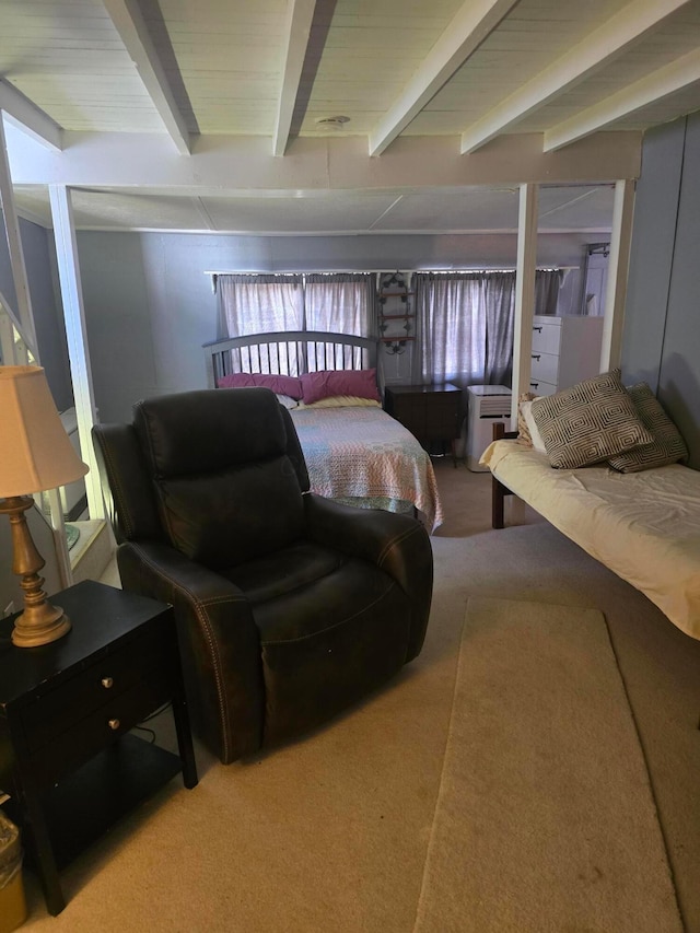 carpeted bedroom with beamed ceiling