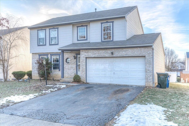 front of property featuring a garage