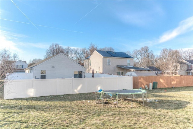 view of yard with a trampoline