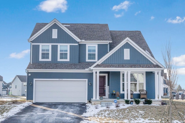 view of front of property featuring a garage