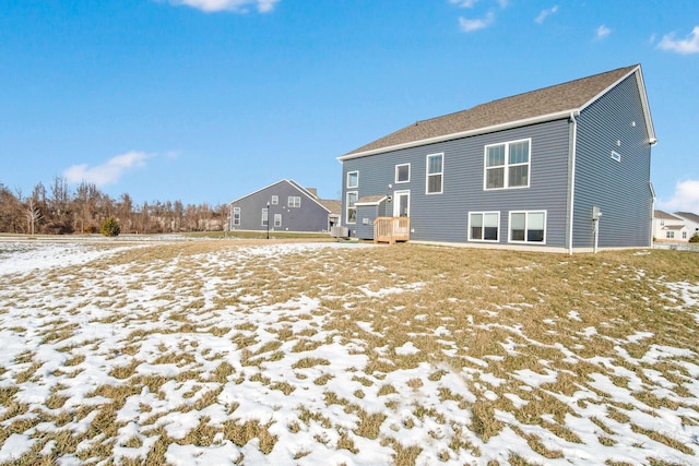 view of snow covered property