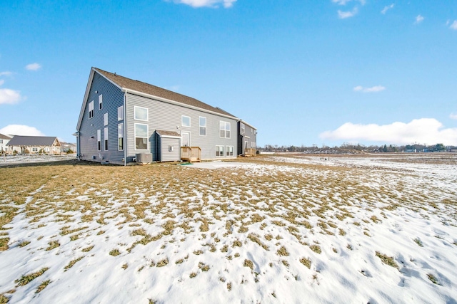 view of snow covered house