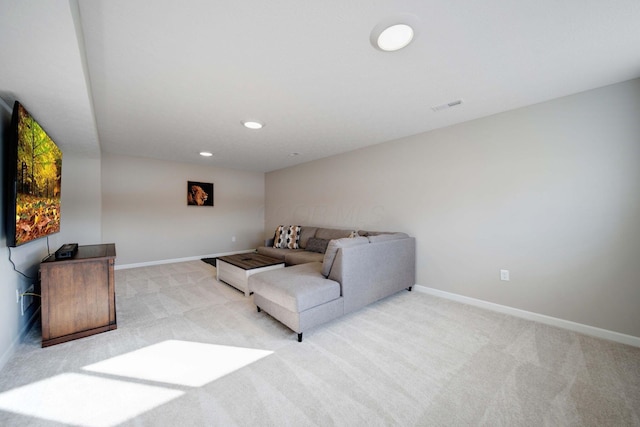 living room featuring light carpet