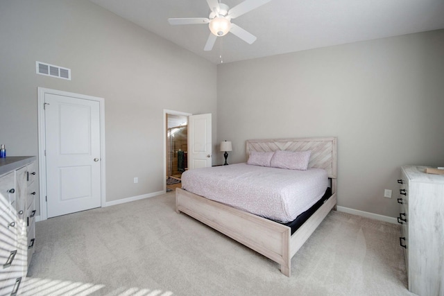 carpeted bedroom with high vaulted ceiling and ceiling fan