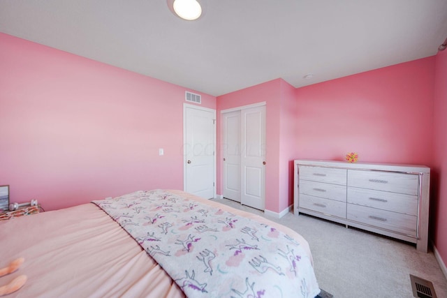 bedroom with light colored carpet