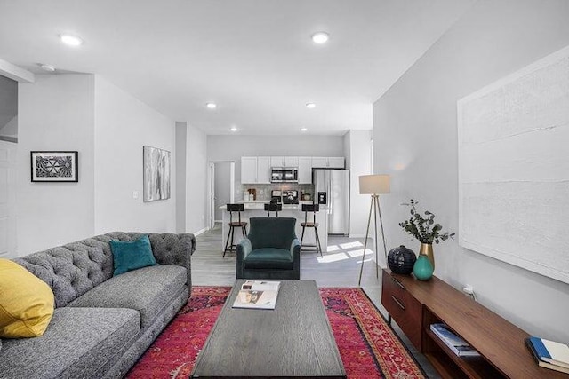 living room featuring light wood-type flooring