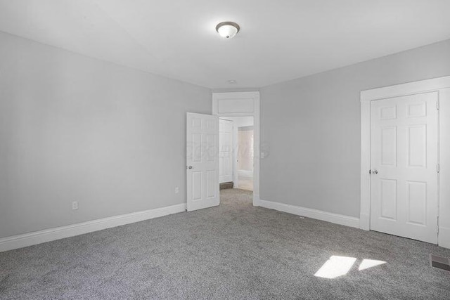 unfurnished bedroom featuring carpet floors