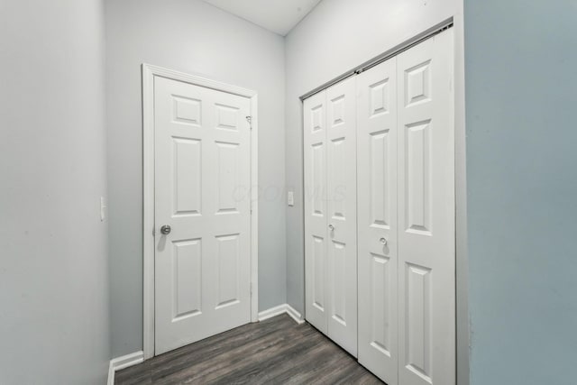 392 Morrison Ave, Columbus, OH 43205 - doorway to outside with dark wood-style floors and baseboards