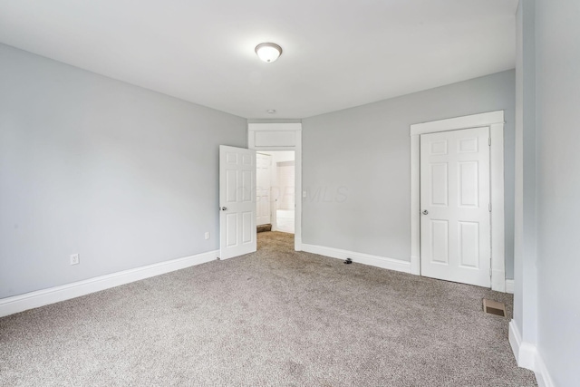 392 Morrison Ave, Columbus, OH 43205 - unfurnished bedroom with carpet and baseboards