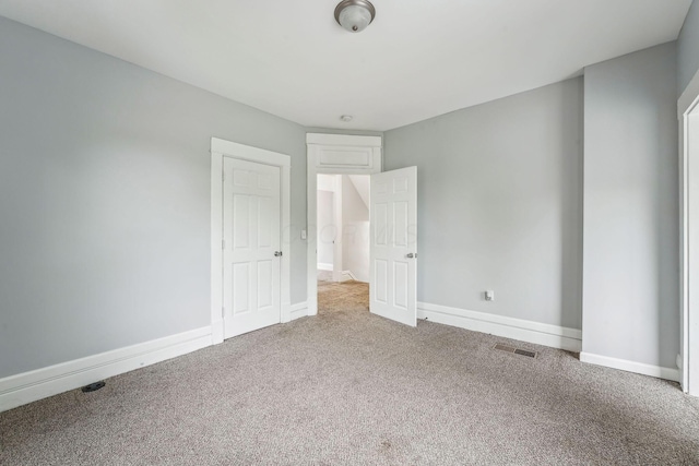 392 Morrison Ave, Columbus, OH 43205 - unfurnished bedroom with carpet floors and baseboards