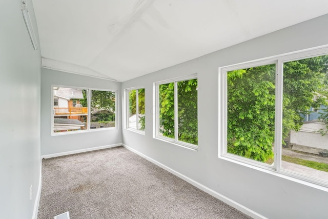 392 Morrison Ave, Columbus, OH 43205 - unfurnished sunroom featuring baseboards, lofted ceiling, and carpet floors