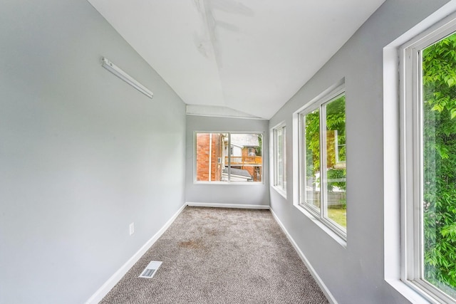 392 Morrison Ave, Columbus, OH 43205 - unfurnished sunroom featuring vaulted ceiling, plenty of natural light, carpet, and baseboards