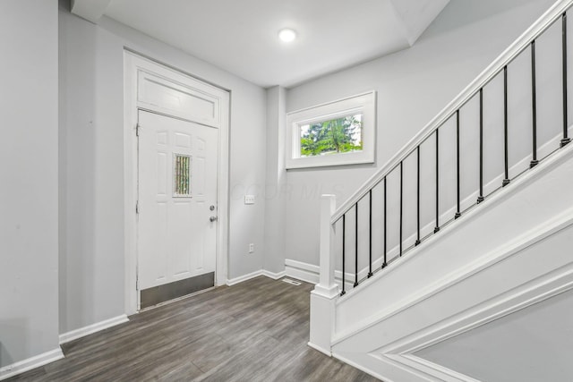 392 Morrison Ave, Columbus, OH 43205 - foyer entrance with wood finished floors, stairway, and baseboards