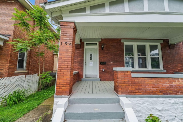 392 Morrison Ave, Columbus, OH 43205 - doorway to property with a porch and brick siding