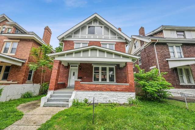 392 Morrison Ave, Columbus, OH 43205 - view of front of property featuring covered porch and brick siding