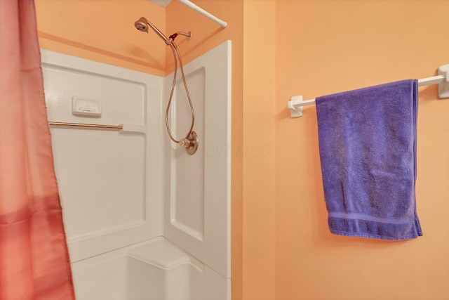 bathroom with a shower with curtain