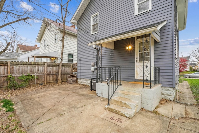 rear view of house with a patio