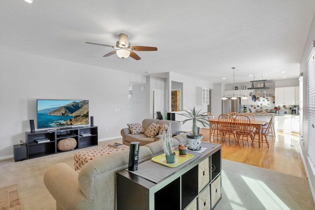 living room with ceiling fan