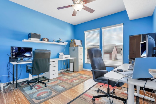 office area featuring light hardwood / wood-style floors and ceiling fan