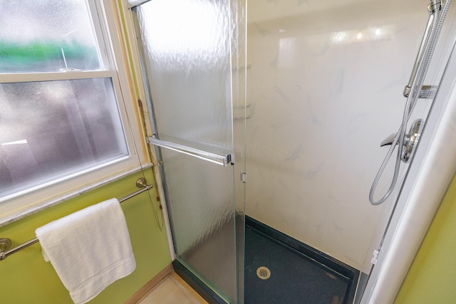 bathroom with an enclosed shower