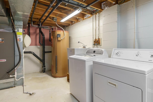 laundry room with separate washer and dryer, heating unit, and water heater