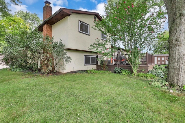 view of yard with a wooden deck