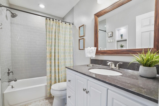 full bathroom featuring vanity, toilet, and shower / bath combo with shower curtain