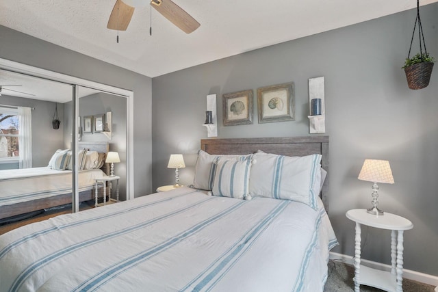 bedroom featuring carpet flooring, ceiling fan, and a closet