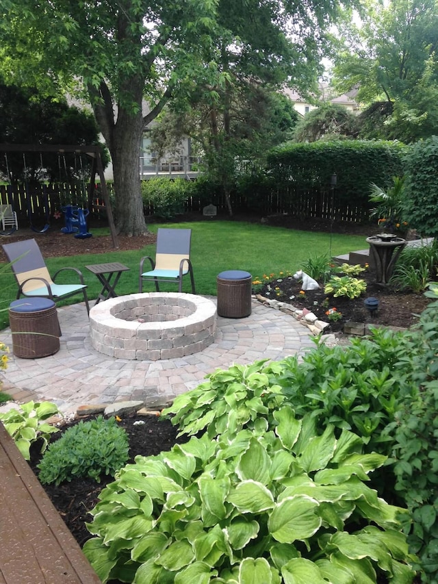 view of patio / terrace with a fire pit