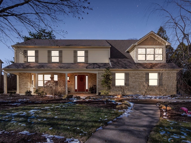 view of front of property with brick siding