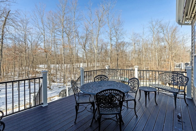 view of snow covered deck