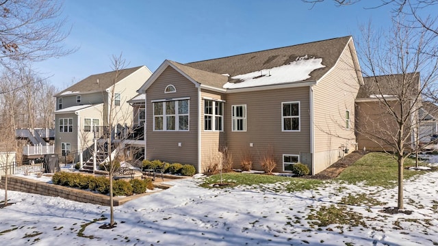 view of snow covered property