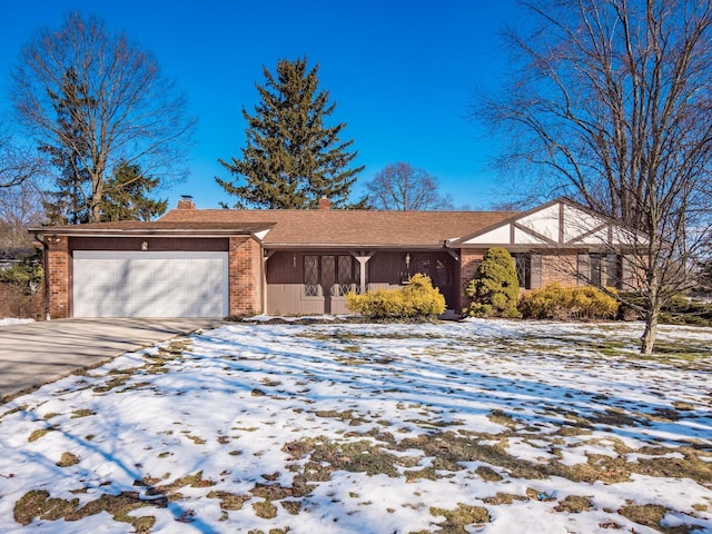 single story home featuring a garage