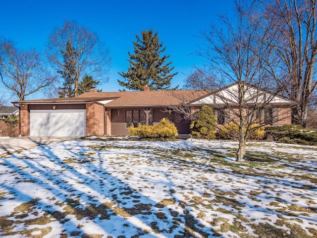 single story home featuring a garage