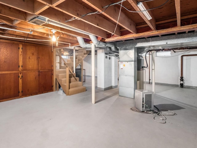 basement featuring heating unit