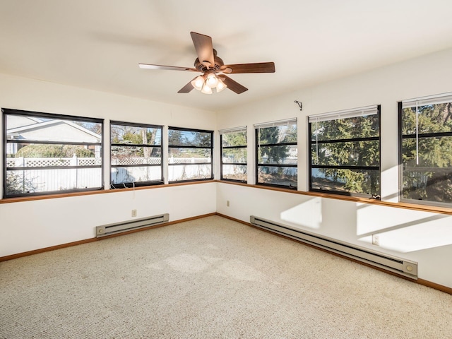 interior space with a baseboard radiator and ceiling fan